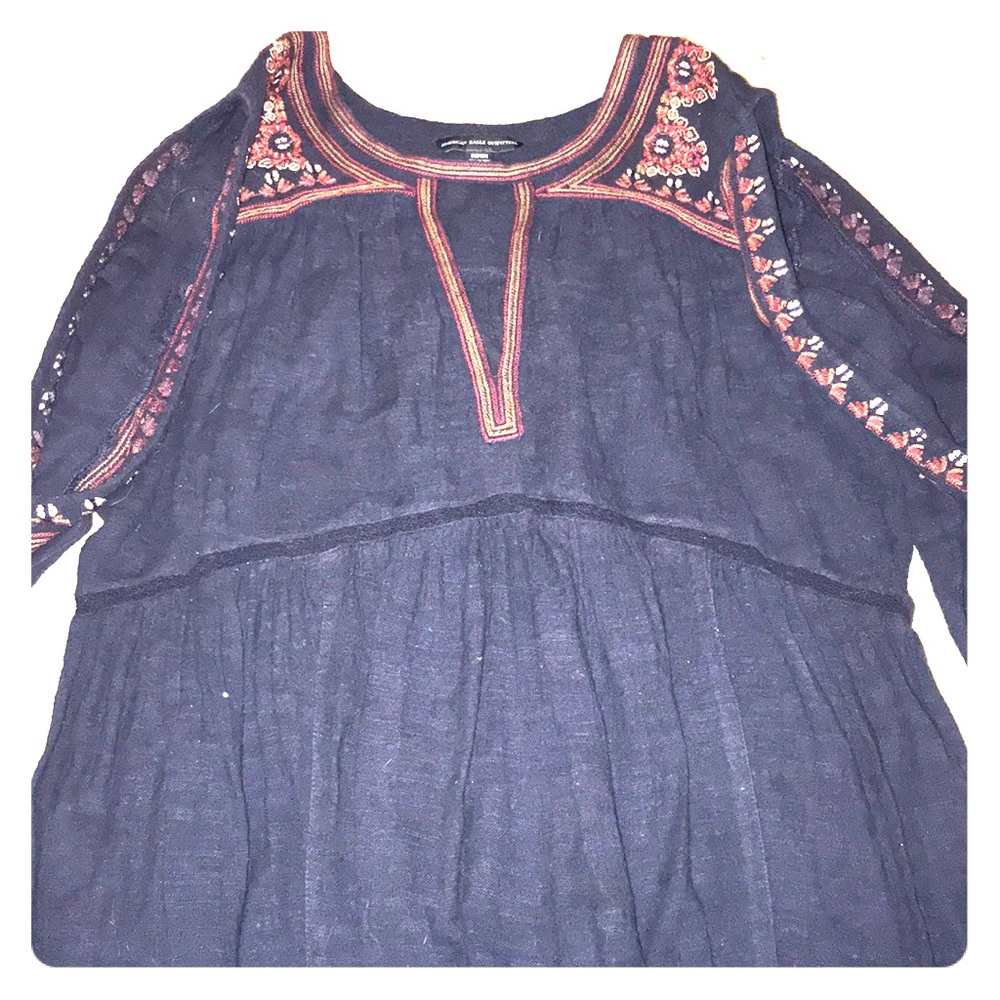 Blouse with cut- outs on the arms and chest